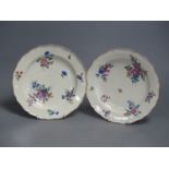 A pair of Royal Worcester silver shaped plates with flowers, c.1775, diameter 22.5cm