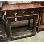A 17th century style oak side tablefitted single drawer on bobbin-turned supports joined by