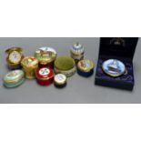 Nine enamelled boxes (one containing a watch, one with musical movement) and a similar pin
