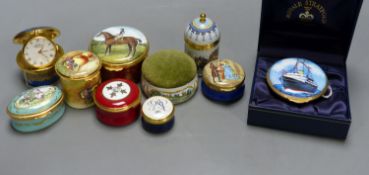 Nine enamelled boxes (one containing a watch, one with musical movement) and a similar pin