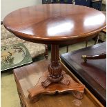 A William IV style mahogany tilt-top centre tableraised on single column and trefoil slab base with