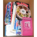 A box of football programmes