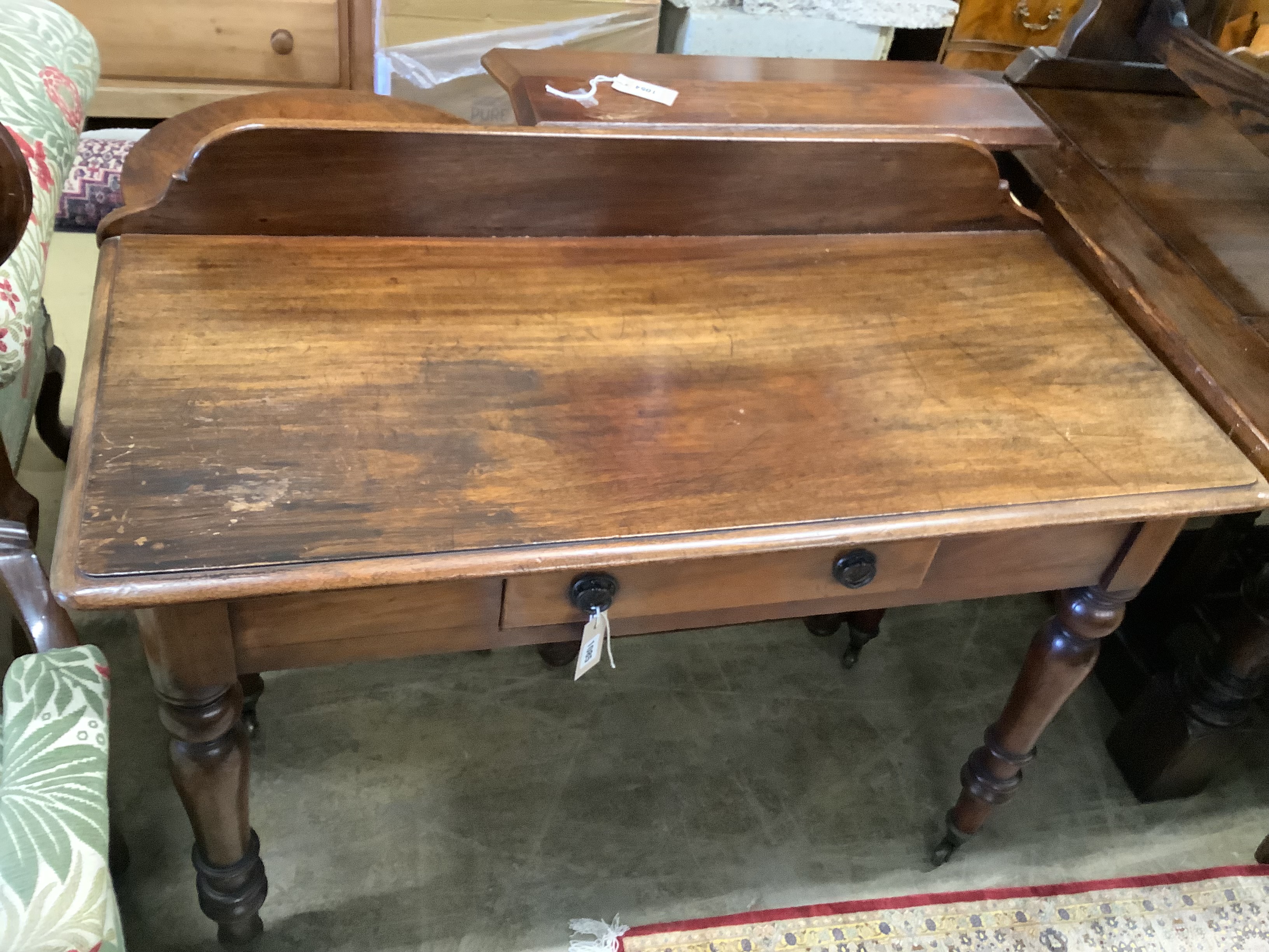 A Victorian mahogany writing tablefitted two small drawers on turned tapered legs, length 106cm, - Image 6 of 6