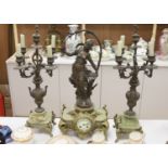 A 19th century French spelter and onyx clock garniture, height 61cm