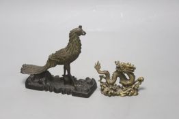 A 19th century Chinese bronze figure of a phoenix, repairs, and a 20th century Chinese bronze