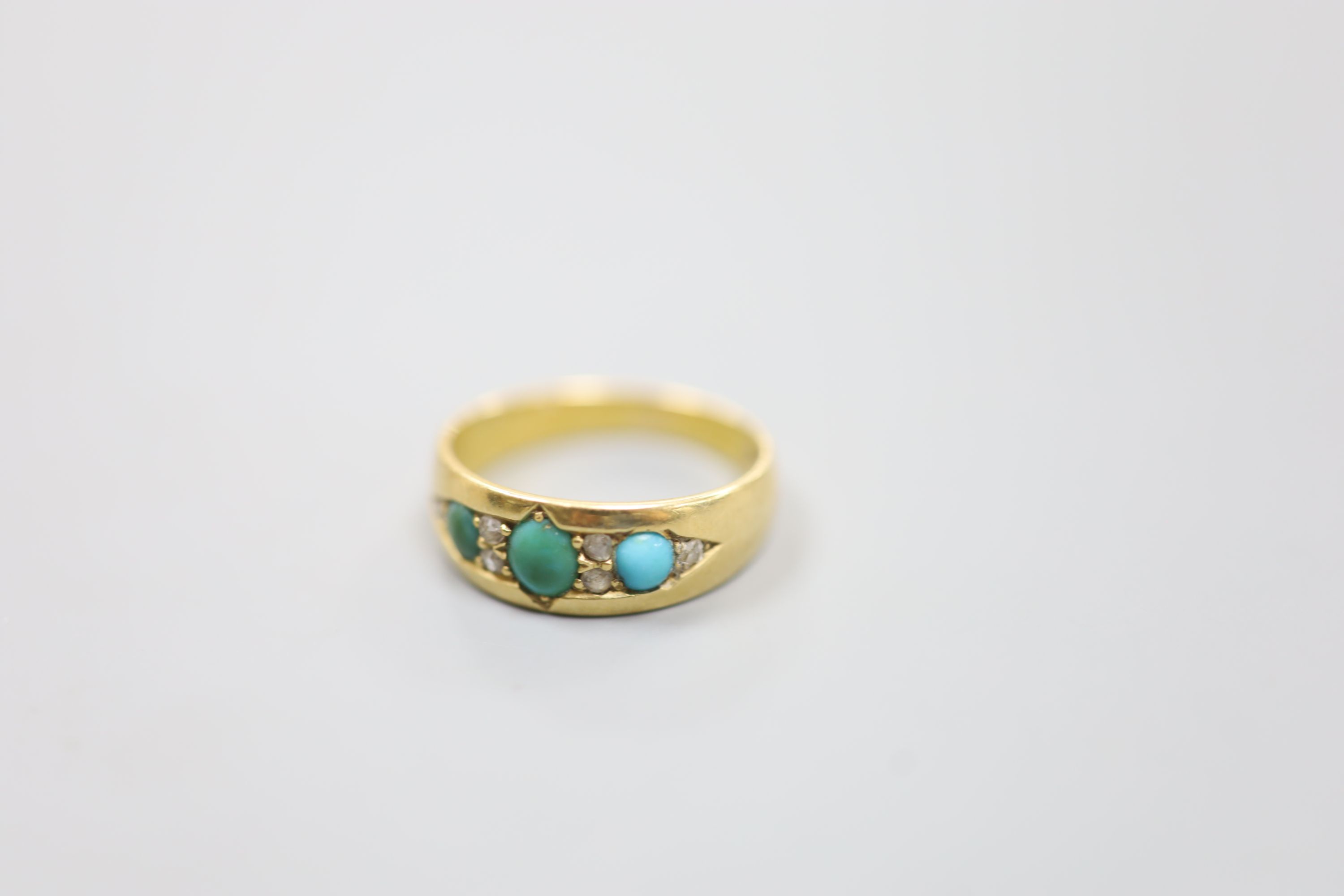 An early 20th century 18ct, three stone turquoise and six stone diamond chip set ring, size M/N, - Image 2 of 3