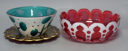 A Bohemian cranberry and white overlay glass circular bowl, a similar conical turquoise bowl and a