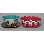 A Bohemian cranberry and white overlay glass circular bowl, a similar conical turquoise bowl and a