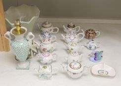 Twelve modern floral-decorated collectors' teapots (V&A Museum Collection), a Spode dish, a table