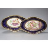A pair of Coalport oval dishes, painted with fruit under blue border, c.1810, length 29cm