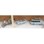 A model of a VW Camper van, a Lambretta and a 1950s Cadalac