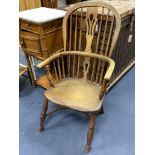 A small Victorian ash and elm Windsor elbow chair