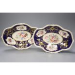 A pair of Crown Derby oval dishes, painted with four floral panels, c.1825, length 31cm