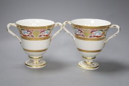 A pair of Derby two handled loving cups, c.1805, painted in arabesque style, pattern no.407, height