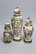 Three early 20th century Chinese crackle glaze vases, two with covers, tallest 33.5cm