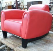 A red leather club armchair, height 70cm, width 87cm, depth 98cm