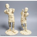 Two Japanese sectional ivory figures of farmers, early 20th century, one signed to base, height
