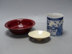 A Chinese blue and white mug, height 13cm, a bowl and a dish,