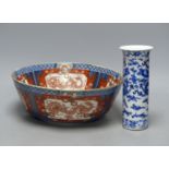 A large Japanese Imari bowl, Meiji period, diameter 31cm, and a Chinese blue and white sleeve vase