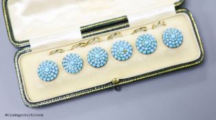 An early 20th century cased set of six yellow metal and turquoise set dress studs (stone missing),