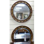 A pair Regency style circular wall mirrors, 44 cm diameter