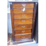 A victorian mahogany Wellington chest of seven drawers, 122 cm high, at 65 cm wide, 41 cm deep