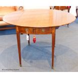 A George III Sheraton period mahogany and satinwood banded oval Pembroke table, 111.5 cm long when