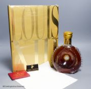 A sealed bottle of Louis XIII Remy Martin Grand Champagne Cognac, Carafe No.DJ9508, with original