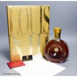 A sealed bottle of Louis XIII Remy Martin Grand Champagne Cognac, Carafe No.DJ9508, with original