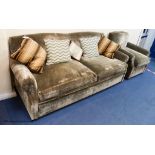 A grey velvet two seat sofa bed, approximately 191 cm wide and a matching armchair, various scatter