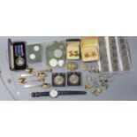 A 9ct and paste set ring, a 9ct gold aeroplane stud, 10kt cross pendant necklace and a quantity of