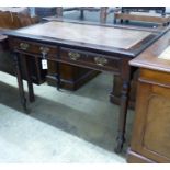 An Edwardian mahogany writing table, length 106cm