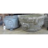 An Edwardian lead garden urn, diameter 33cm and a later composition planter, diameter 44cm