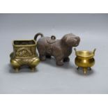 Two Chinese bronze censers and a terracotta vessel, 19cm