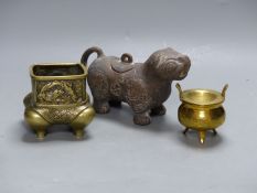 Two Chinese bronze censers and a terracotta vessel, 19cm