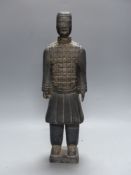 A Chinese grey pottery figure in Han style, height 47cm