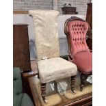 A Victorian mahogany framed prie dieu chair, upholstered in cream brocade
