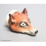 An early 19th century English porcelain 'Tally Ho' fox head stirrup cup, length 11cm