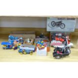 A collection of tinplate motorcycles etc