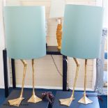 A pair of gilt composition 'goose leg' table lamps, duck egg shades, total height 93 cm