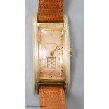 A gentleman's stylish 1930's 10k gold filled Longines manual wind rectangular dial wrist watch, on
