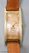 A gentleman's stylish 1930's 10k gold filled Longines manual wind rectangular dial wrist watch, on