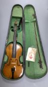 An early 20th century violin, unlabelled case, with bow, length 60cmUnmarked