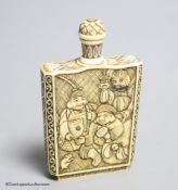 A Japanese carved ivory ‘Gods of Happiness’ snuff bottle, early 20th century