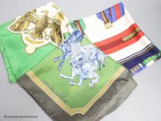 Three vintage Hermes silk scarves, 'Scarabee et Pectoraux' (gold, green, white), 'Carrousel' (green