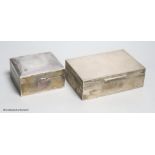 A 1950's engine turned silver cigarett box by Asprey & Co, 14cm and a sterling cigarette box by