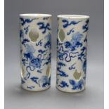 A pair of early 20th century Chinese blue and white hat stands, Kangxi marks, 29cm high