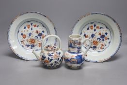 A pair of 18th century Chinese Imari style dishes, diameter 22.5cm, together with a similar