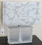 A contemporary clear acrylic slab table lamp, 25.5 cm high to light fitting, fabric shadeProvenance