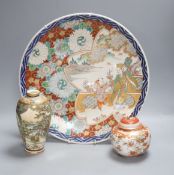 A Japanese Imari charger, a Kutani jar and cover and a Satsuma vase, diameter 40cm